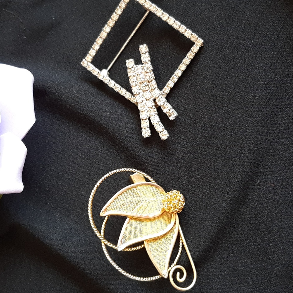 Vintage Set of two brooches from 1950's.  Gold tone.  Rhinestones